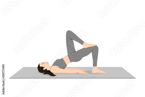 Bridge Pose Foot On Knee. Beautiful girl practice Setubandha Sarvangasana Foot On Knee. Young attractive woman practicing yoga exercise. working out, black wearing sportswear, grey pants and top