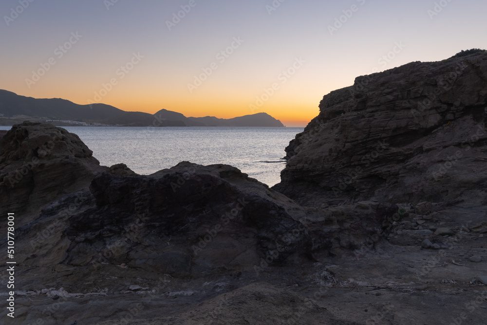 Rocky beach on the Mediterranean at sunrise
