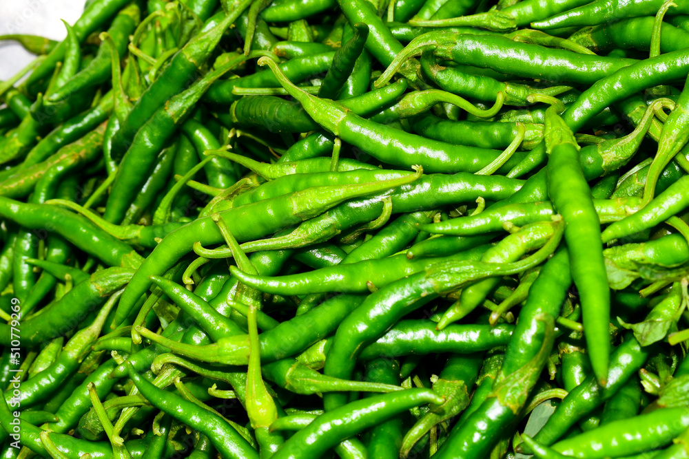 Close up top view of freshly harvested green chillies Close up top view of freshly harvested green chillies