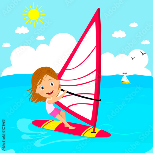Young girl windsurfing  in the sea
