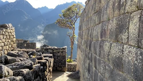 Machu Picchu ancient inca town located in mountains, world historical heritage, one of seven wonders of the world, wonderful sunny day, amateur photography, shot on mobile phone, travel concepts photo