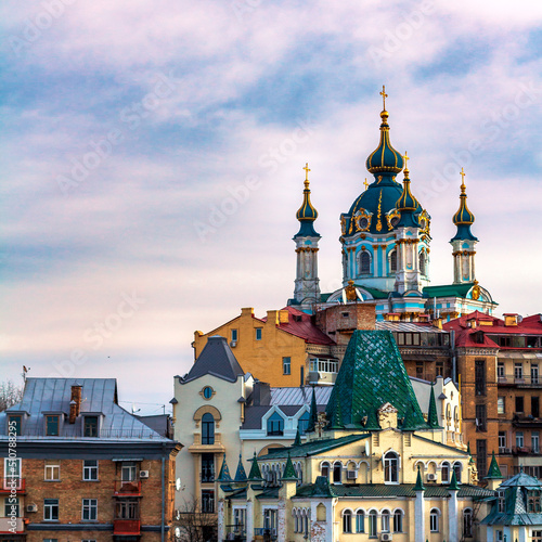 Saint Andrew church and old buildings on the hill in Kyiv, Ukraine . High quality photo