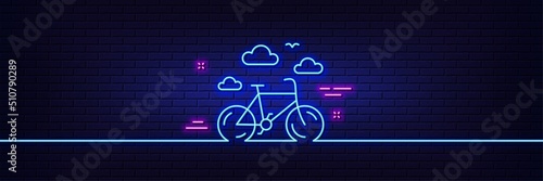 Neon light glow effect. Bike rental line icon. Bicycle rent sign. Hotel service symbol. 3d line neon glow icon. Brick wall banner. Bike rental outline. Vector