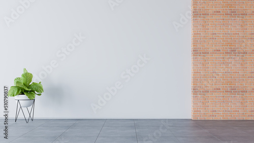 Stanza vuota con parete in mattoni e vaso photo