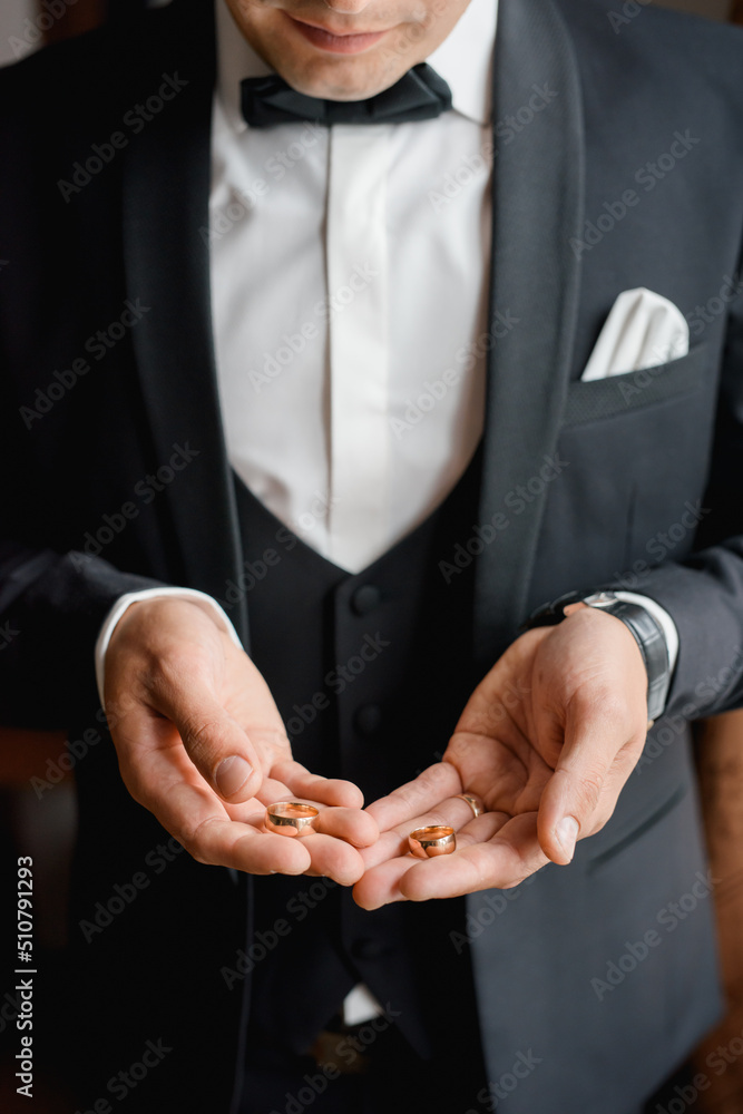 man with hands clasped