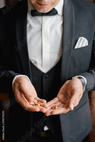 man with hands clasped