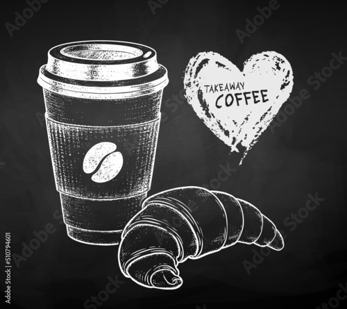 Chalked illustration of Coffee cup and croissant