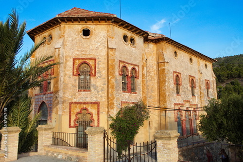 Beautiful and deteriorated neo-mudejar building in the natural environment of La Fuesanta in Murcia photo