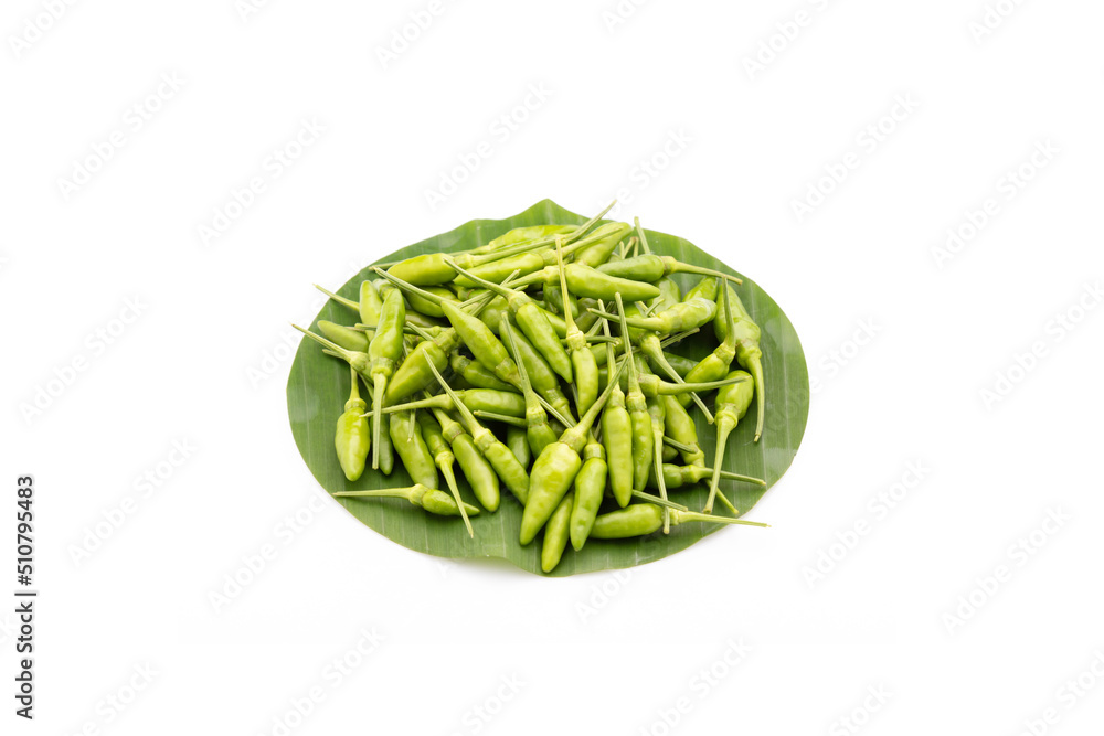 pile of green Bird Chilli or Thai pepper isolated on white