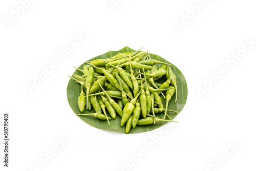 pile of green Bird Chilli or Thai pepper isolated on white