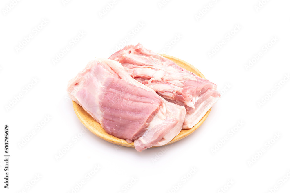 Raw streaky pork on wooden dish isolated on white background. Food and healthcare concept Raw streaky pork on wooden dish isolated on white background. Food and healthcare concept