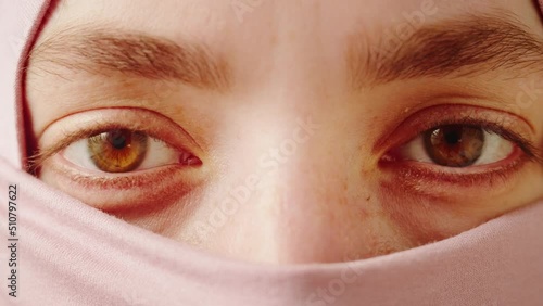 Wallpaper Mural Young woman in hijab. Female brown eyes close-up. Wearing traditional Islamic clothes. Religious holiday Ramadan, holy month. Worship and culture concept, diversity people.  Torontodigital.ca