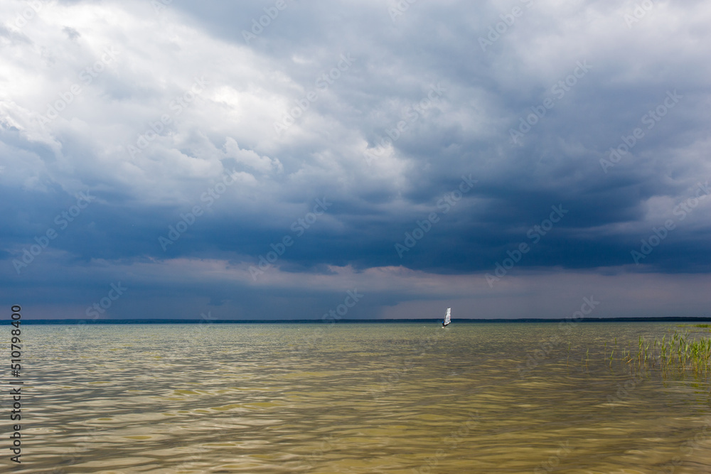 Fototapeta premium Clouds gathered on Lake Pleshcheyevo