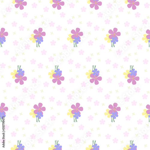 Pretty bunch of flowers seamless pattern. A bunch of colorful flowers on a pink tone background. Surrounded by cute little pastel pink flowers.