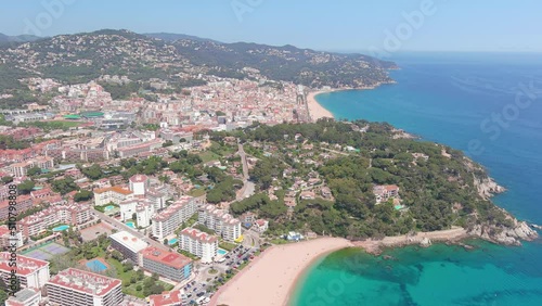 Lloret de Mar, Spain: Aerial view of famous resort town on Costa Brava near Barcelona, Fenals Beach (Playa de Fenals), turquoise waters of Mediterranean Sea - landscape panorama of Europe from above photo