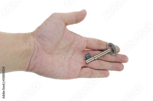 hand with key on white background