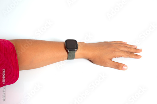 Women Hand Wearing Smartwatch Checking heart rate, the number of steps walk or run, and see the time. isolated on white background.