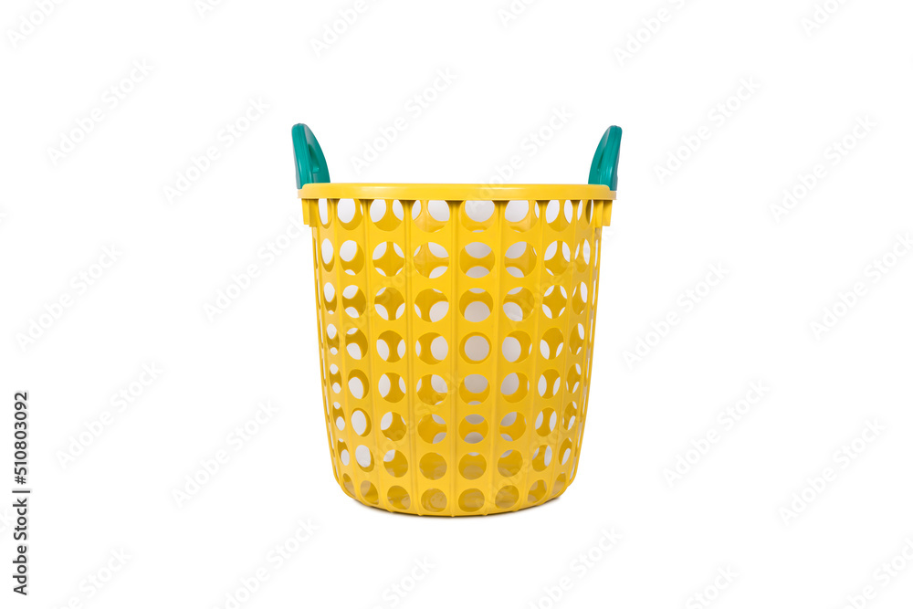 Yellow plastic empty laundry basket with green handle isolated on white background. Yellow plastic empty laundry basket with green handle isolated on white background.
