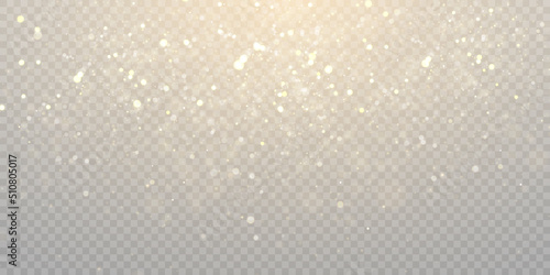Light gold background with bokeh, falling golden sparks, dusty glitter with blur effect for the design of cards, invitations, congratulations, presentations.