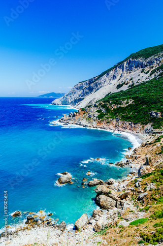 Mediterranean hidden places at Kastro, Skiathos island, Greece. Beautiful vivid panorama view of blue aegean sea coast from wild cliff. Summer holiday vacation tour.