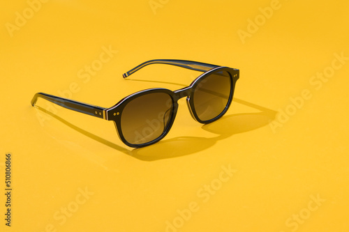 Fotografie Black sunglass with oval frame, polarizing lenses