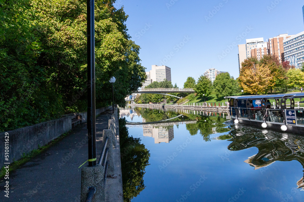 Reflections on Rideau Canal on a Sunny Day