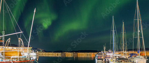 Polar Lights over Trondheim reflecting in the Harbor