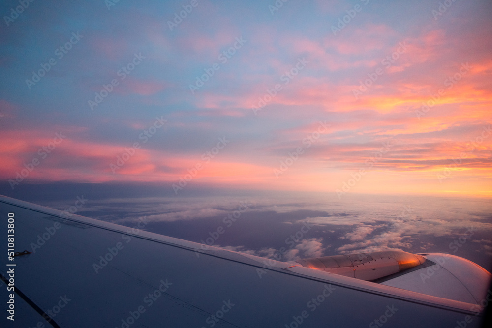 View from an airplane of a sunrise from the sky