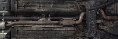 Konstfotografi Car lifted in maintenance service to check availability undercarriage of automob