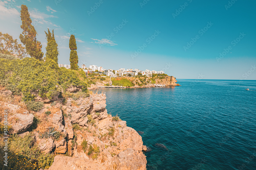 Naklejka premium Lara district of a resort town of Antalya, Turkey situated on a high cliff. Vacation and coastline concept