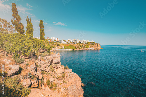 Lara district of a resort town of Antalya, Turkey situated on a high cliff. Vacation and coastline concept photo