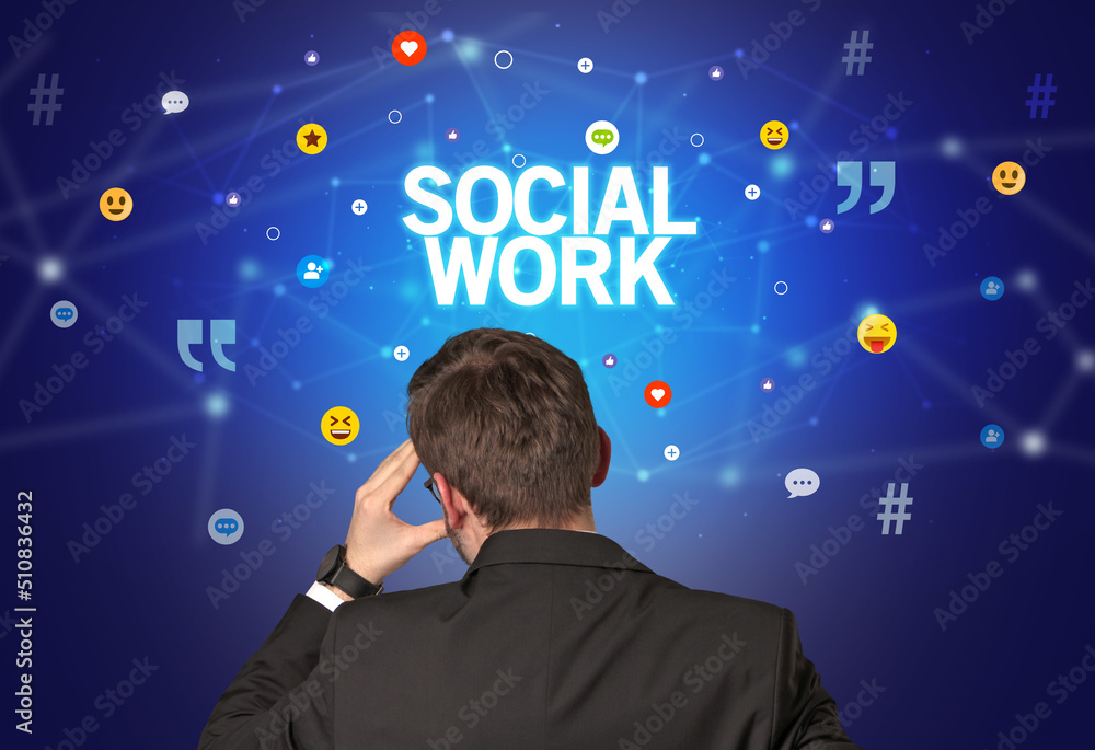 Rear view of a businessman, social media concept Rear view of a businessman, social media concept