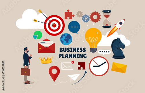 Smart and young businessman in formal clothes near light wall with vector drawings. Concept of business plan development.