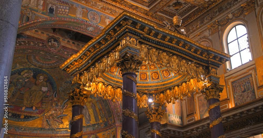 High angle shot of golden angel decorations high altar Basilica Santa Maria Maggiore in Rome Italy. One of 4 Papal basilicas, built in honor of Virgin Mary Rome, Italy. 4K. High angle shot of golden angel decorations high altar Basilica Santa Maria Maggiore in Rome Italy. One of 4 Papal basilicas, built in honor of Virgin Mary Rome, Italy. 4K.