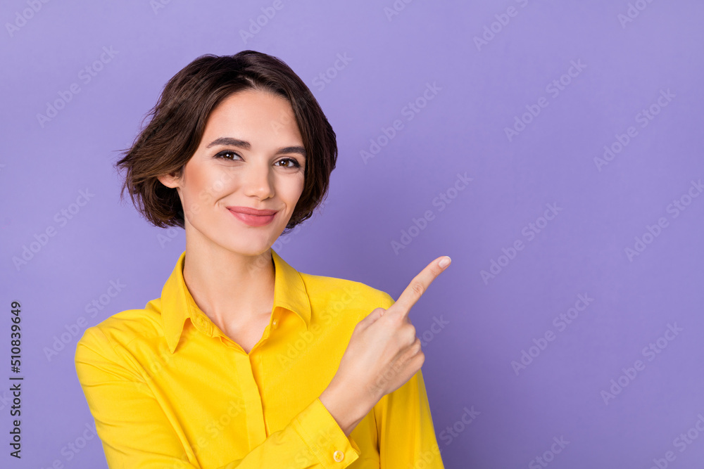 Photo of cute millennial bob hairdo lady index promo wear yellow shirt isolated on violet color background Photo of cute millennial bob hairdo lady index promo wear yellow shirt isolated on violet color background