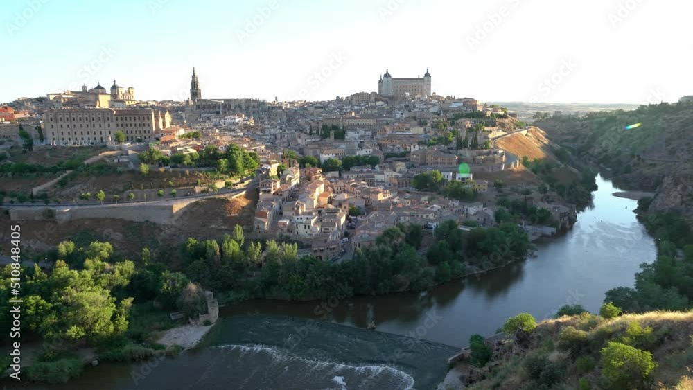 Aerial view of the medieval city of Toledo with the Tagus River at its feet, Spain Aerial view of the medieval city of Toledo with the Tagus River at its feet, Spain