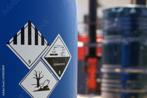 Corrosive chemical symbols on a chemical tank photo