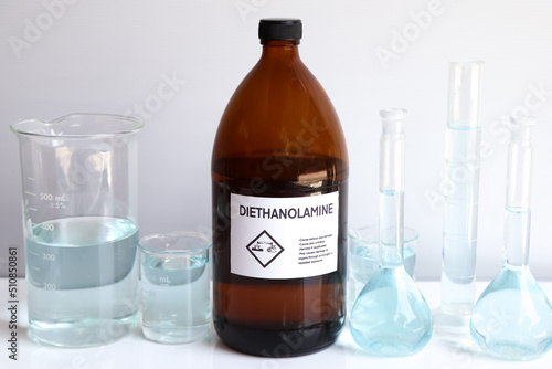 diethanolamine in bottle, chemical in the laboratory photo