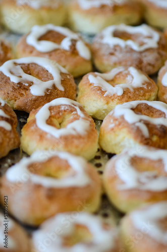 homemade donuts with some bittersweet icying just came out of the oven photo