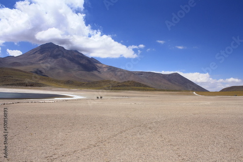 Salt lagunas and volcanos and red rocks southern from San Pedro de Atacama. Stunning scenery at Atacama desert  Chile  South America