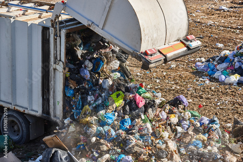 Bild auf Leinwand Truck unloading garbage on an open air dump. Waste treatment