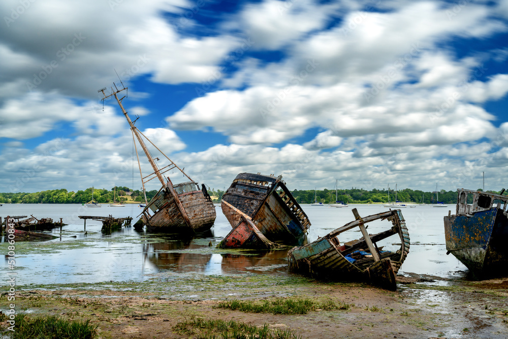 view of the boat graveyard at Pin Mill on the River Orwell in Suffolk at low tide view of the boat graveyard at Pin Mill on the River Orwell in Suffolk at low tide
