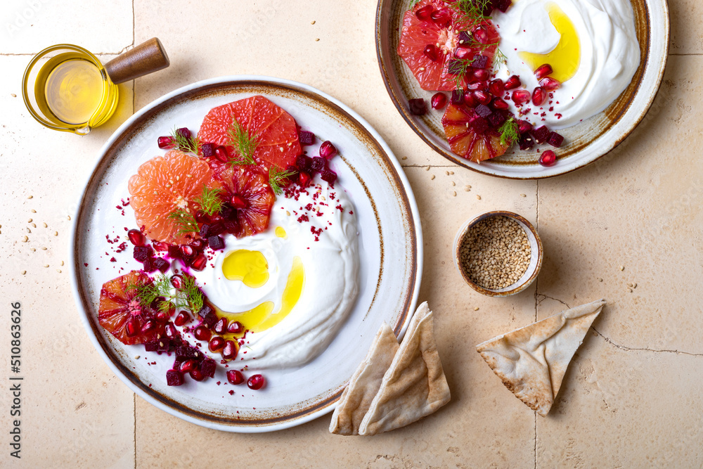 Labneh middle eastern lebanese cream cheese dip. Labneh with grapefruit, roasted beetroot