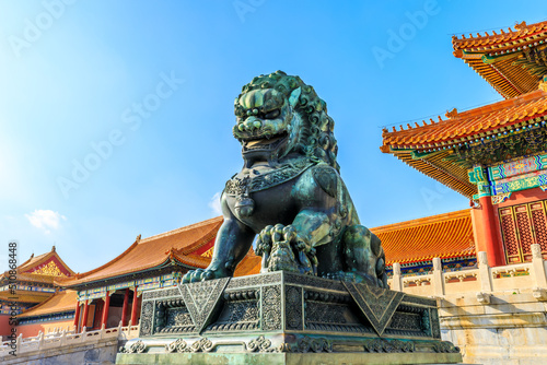 Bronze lion at the Forbidden City, Beijing, China. Chinese cultural symbols.