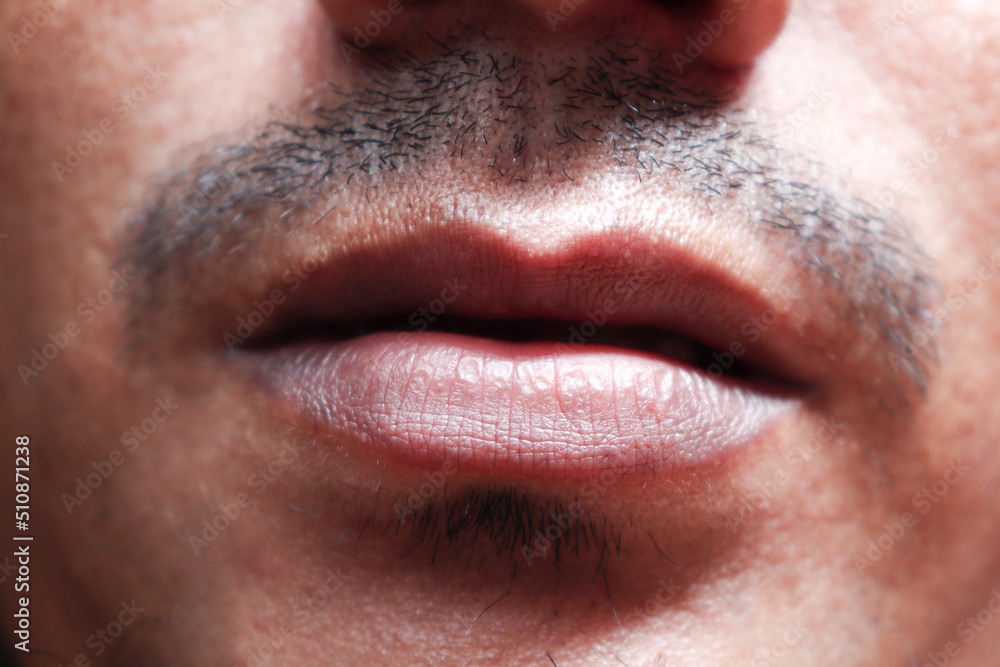 a lips closeup of man a lips closeup of man