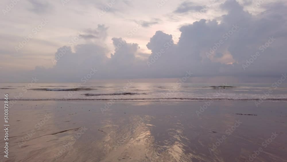 slow-motion natural sea wave water with foam on the sandy beauty white beach, summer beach seascape slow-motion natural sea wave water with foam on the sandy beauty white beach, summer beach seascape
