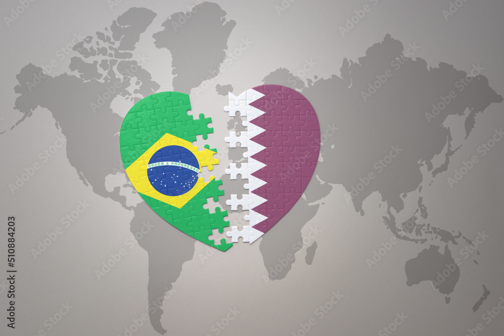 puzzle heart with the national flag of brazil and qatar on a world map background.Concept.