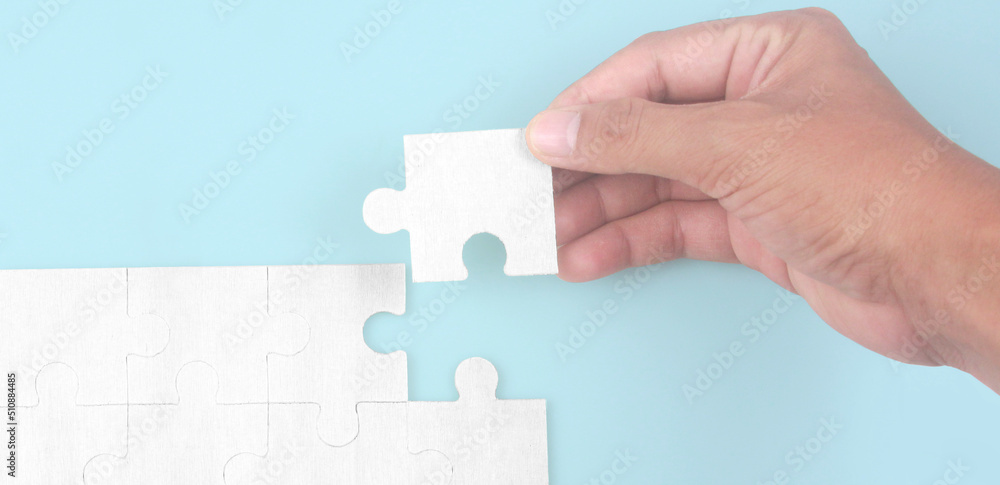 Connecting jigsaw puzzle. Business solutions success Connecting jigsaw puzzle. Business solutions success