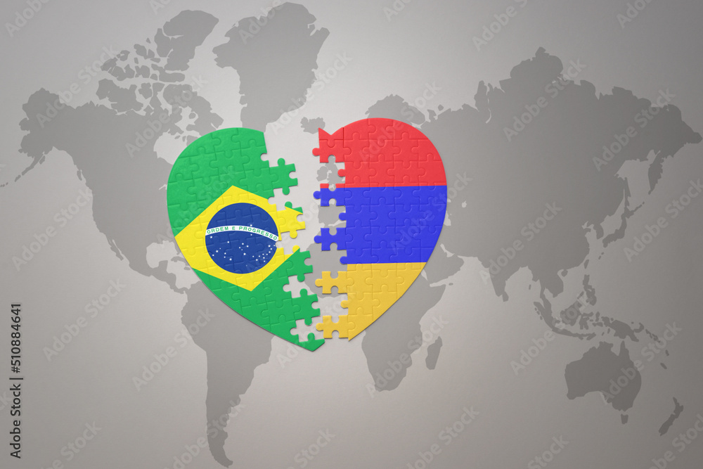 puzzle heart with the national flag of brazil and armenia on a world map background.Concept.