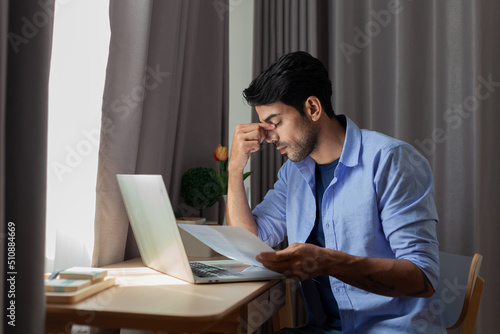 A man with financial stress. Business man sad due to financial problems. Not enough money to pay for the house. debt. Interest. Paying rent. arrears